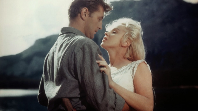 Robert Mitchum et Marilyn Monroe dans Rivière sans retour.